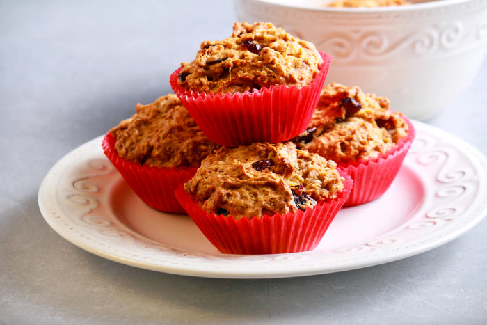 True Orange Ginger Cranberry Walnut Muffins