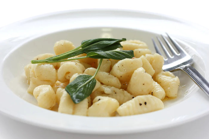 Gnudi with a True Orange-Brown Butter Sauce