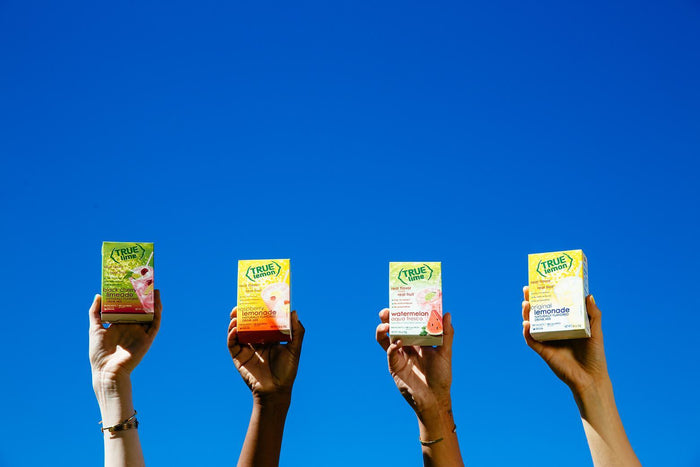 women sells organic product at a farmers market