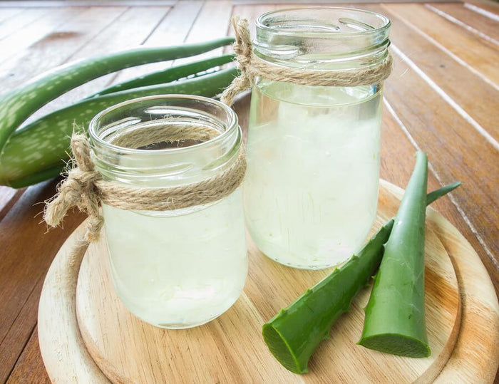 aloe water in a glass with ice