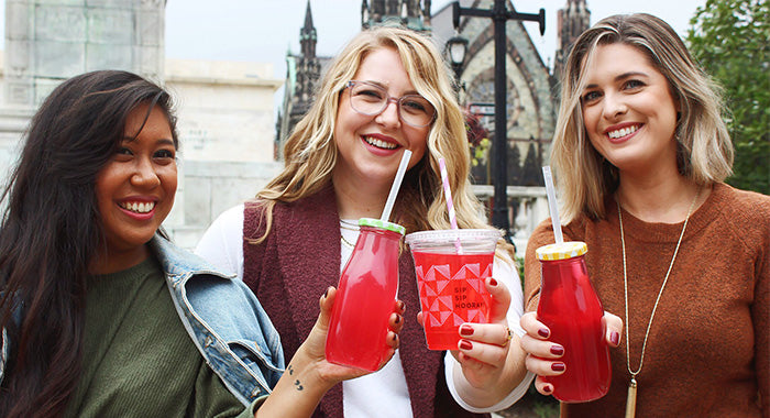 Three friends drinking True Lemon drinks together